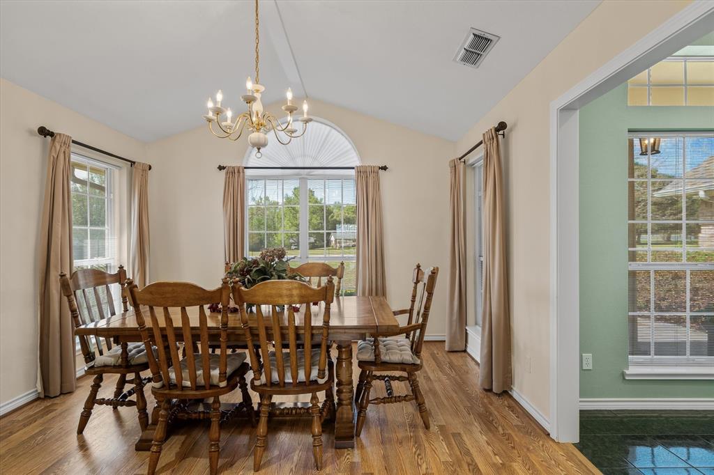 271 VZ County Road Canton, TX 75103 - Photo 12 of 40 a view of a dining room with furniture window and wooden floor
