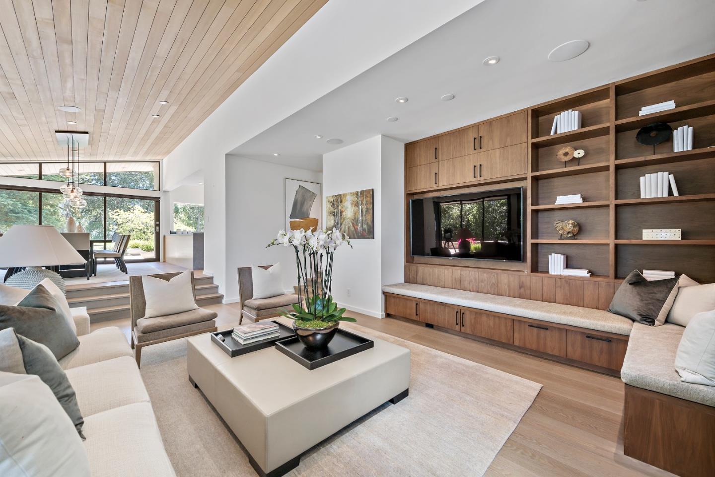 396 Raymundo Drive Woodside, CA 94062 - Photo 36 of 58 a living room with furniture and a flat screen tv