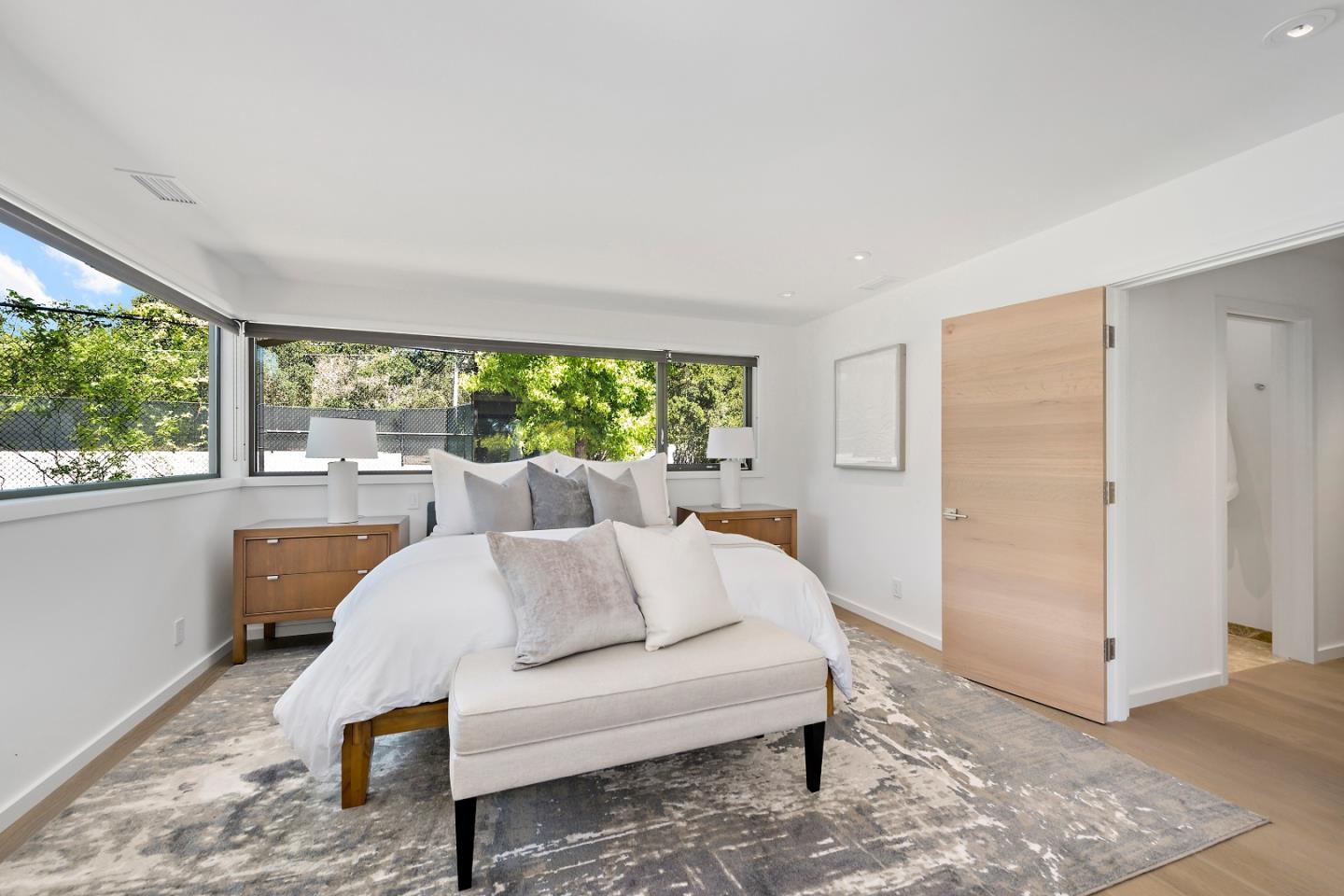 396 Raymundo Drive Woodside, CA 94062 - Photo 37 of 58 a living room with furniture and a large window