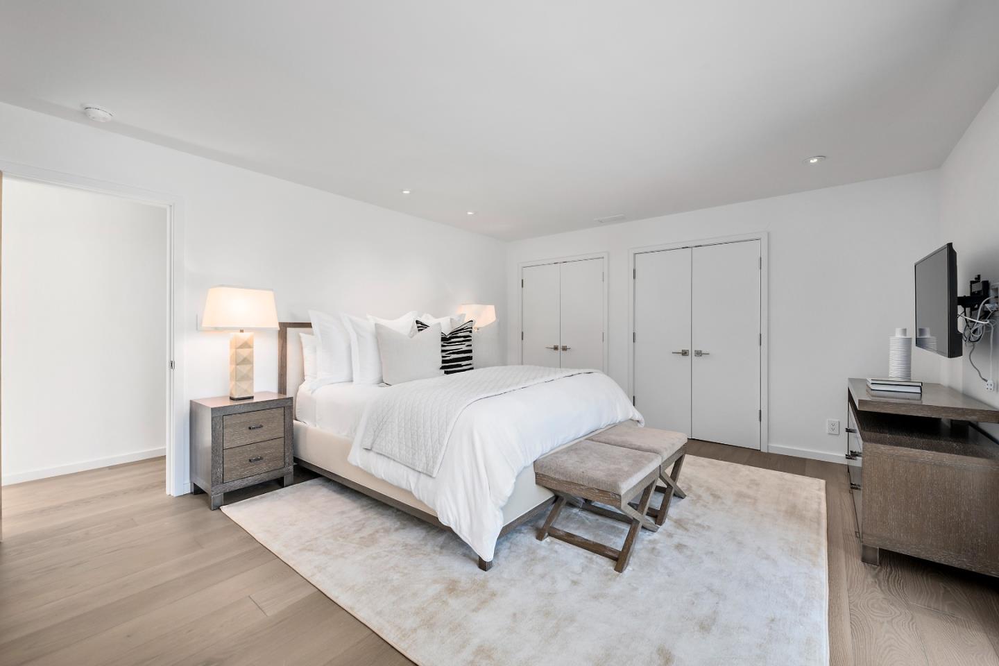 396 Raymundo Drive Woodside, CA 94062 - Photo 38 of 58 a bedroom with a bed and furniture