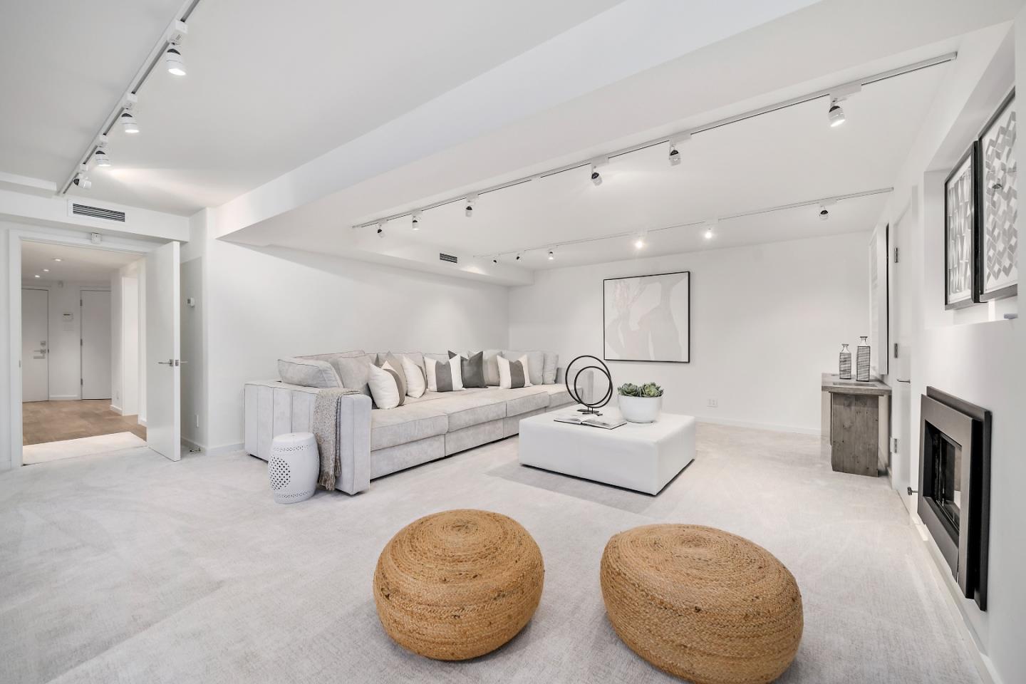 396 Raymundo Drive Woodside, CA 94062 - Photo 39 of 58 a living room with furniture and a fireplace