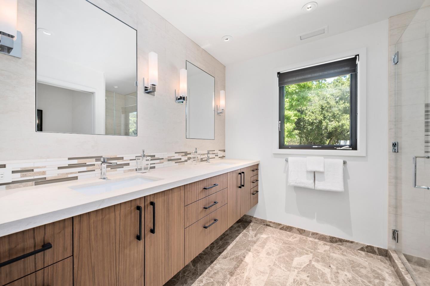 396 Raymundo Drive Woodside, CA 94062 - Photo 42 of 58 a bathroom with a granite countertop sink mirror and a