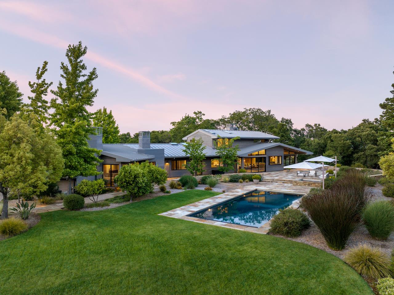 396 Raymundo Drive Woodside, CA 94062 - Photo 43 of 58 a view of a garden with a house in the background