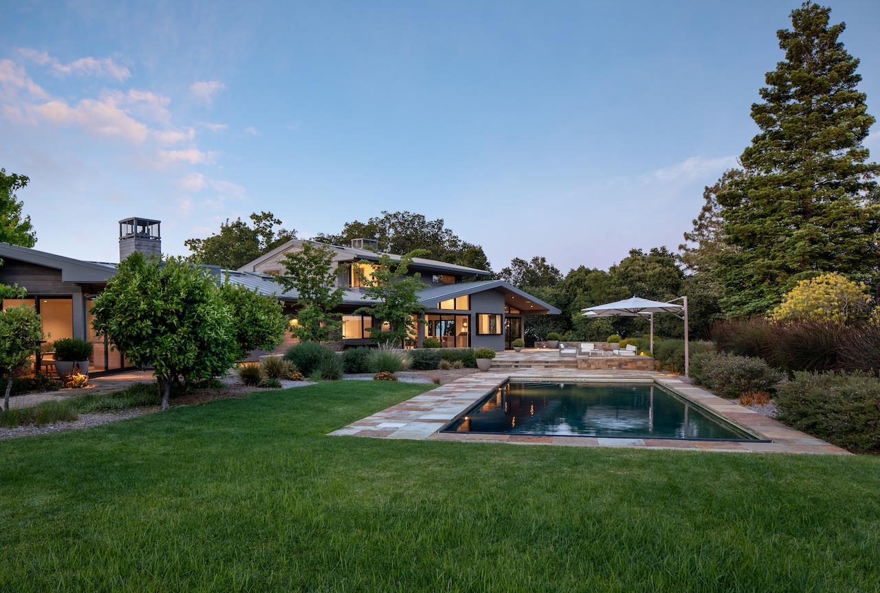 396 Raymundo Drive Woodside, CA 94062 - Photo 47 of 58 a front view of a house with garden