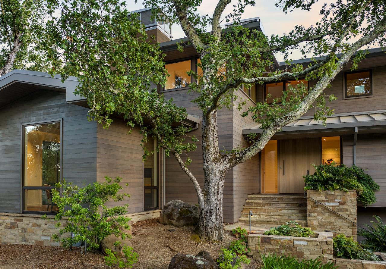 396 Raymundo Drive Woodside, CA 94062 - Photo 55 of 58 a front view of a house with garden
