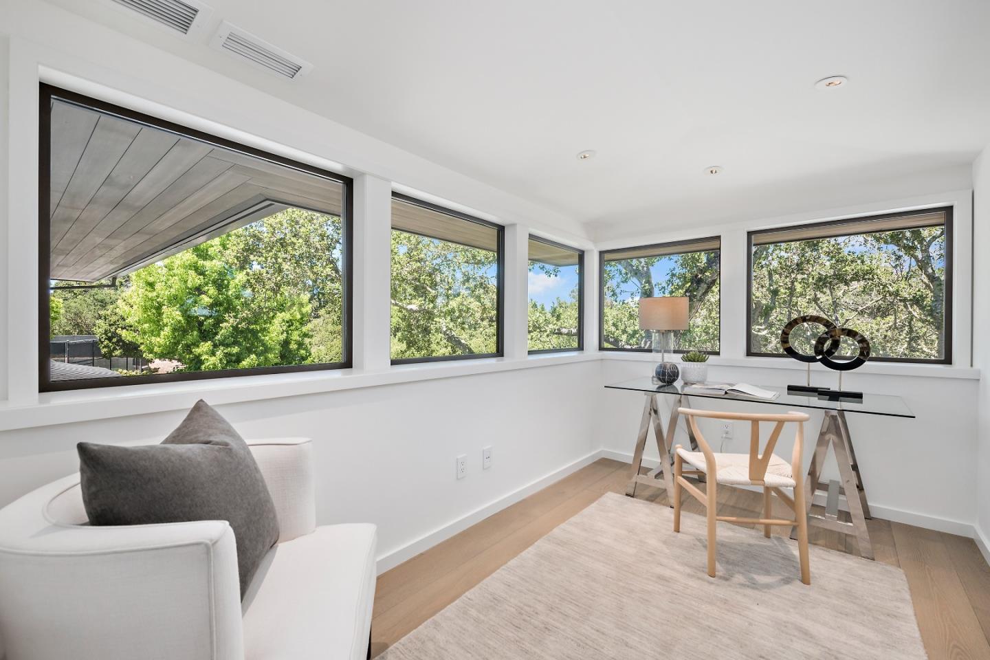 396 Raymundo Drive Woodside, CA 94062 - Photo 9 of 58 a living room with furniture and a large window