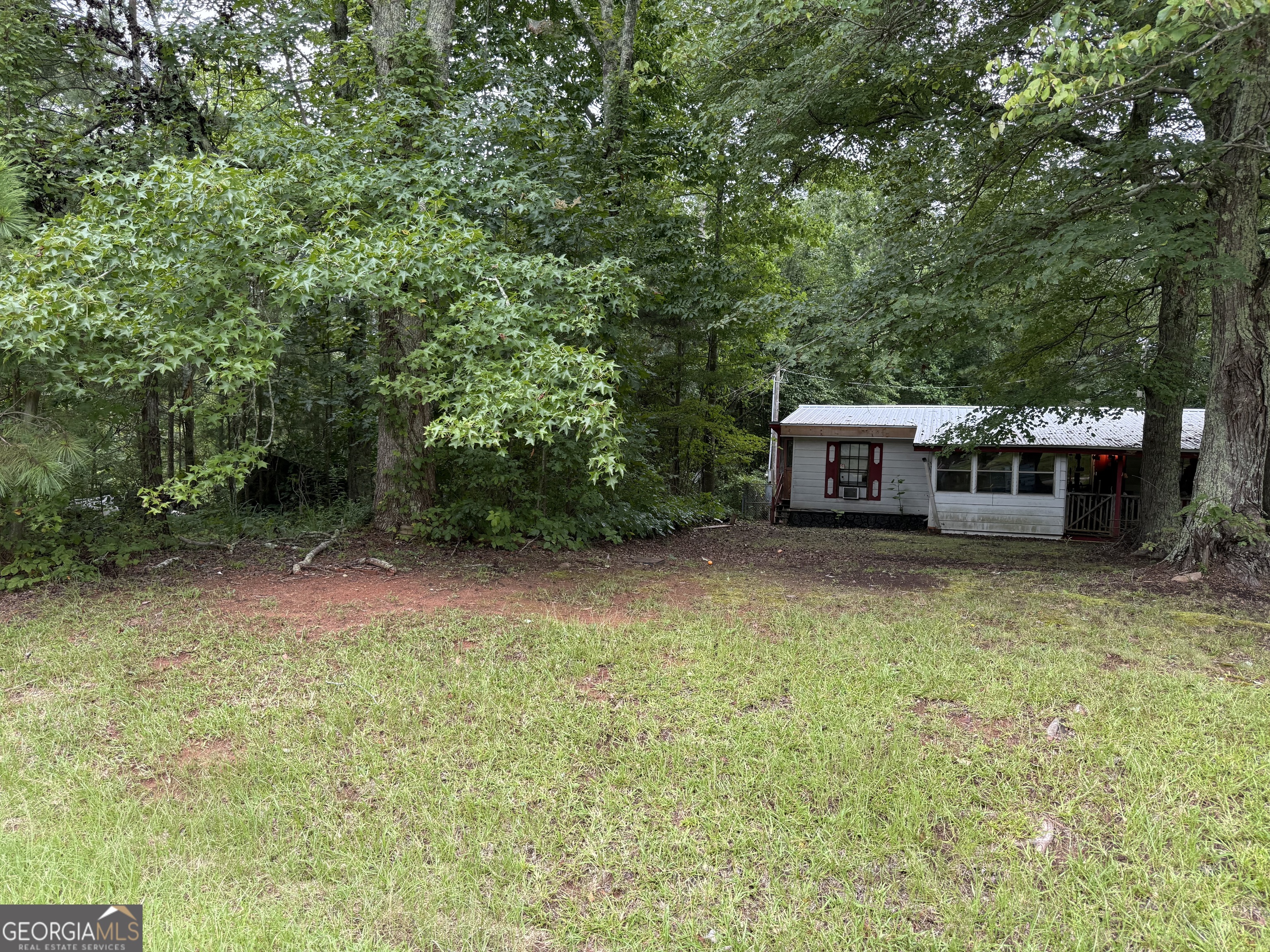 2387 5 Points Road Waco, GA 30182 - Photo 3 of 8 a view of a house with a yard