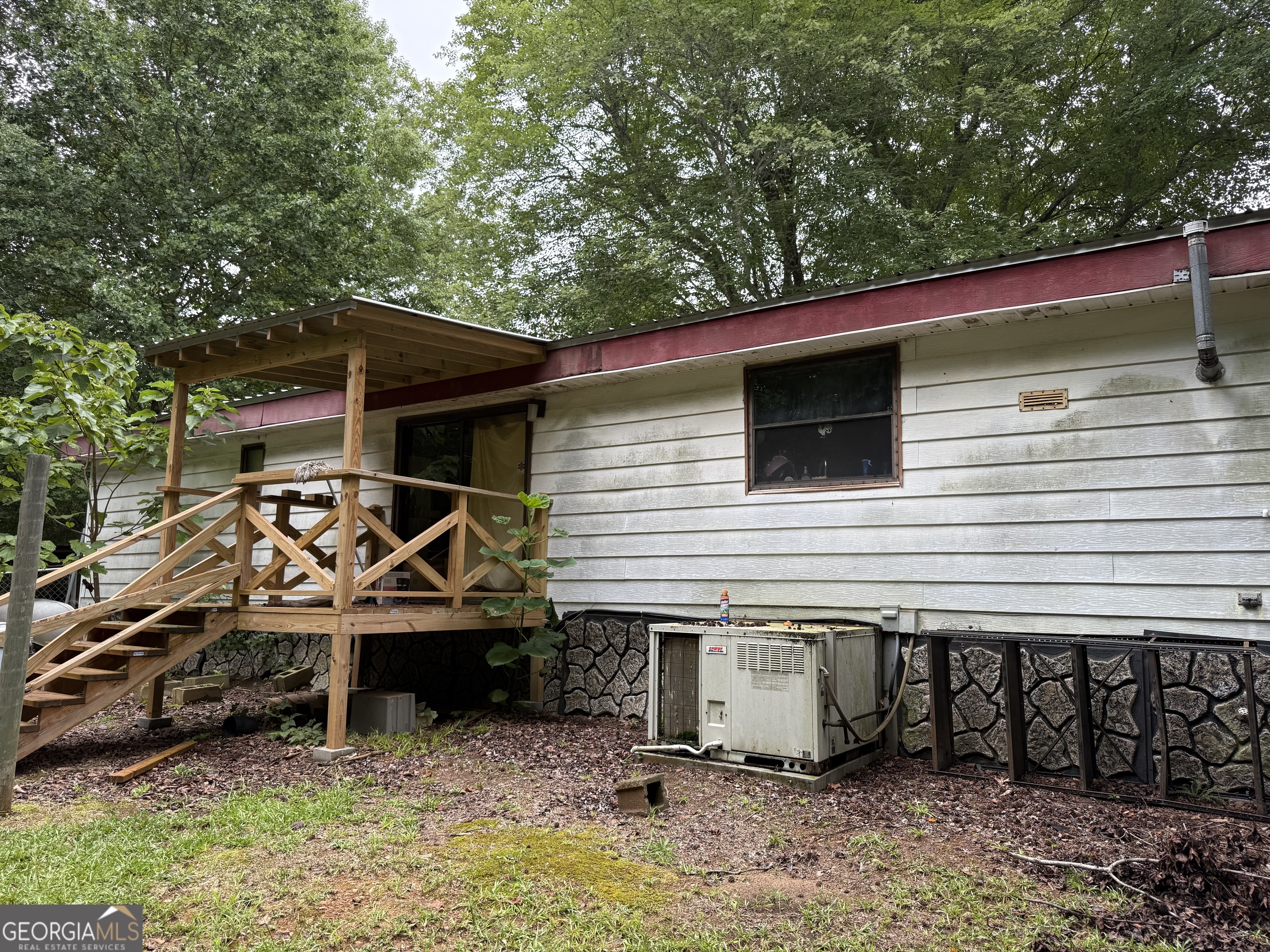 2387 5 Points Road Waco, GA 30182 - Photo 8 of 8 a view of a house with backyard