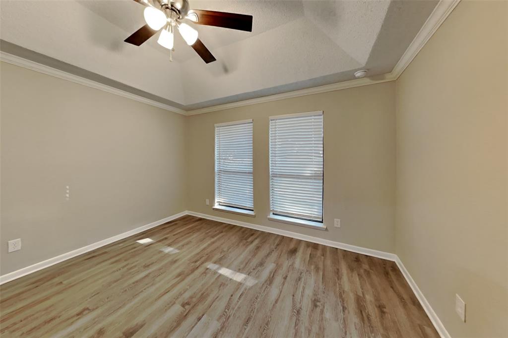 5707 Cherrywood Lane Arlington, TX 76016 - Photo 6 of 20 wooden floor in an empty room with a window