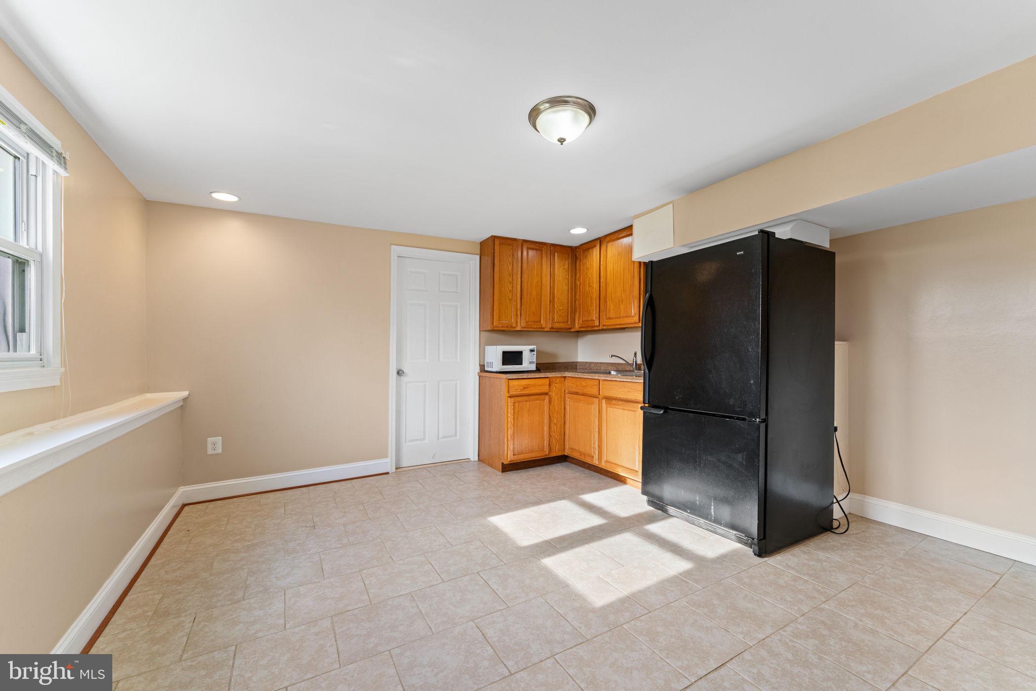 9207 4th Street Lanham, MD 20706 - Photo 27 of 37 Basement kitchen
