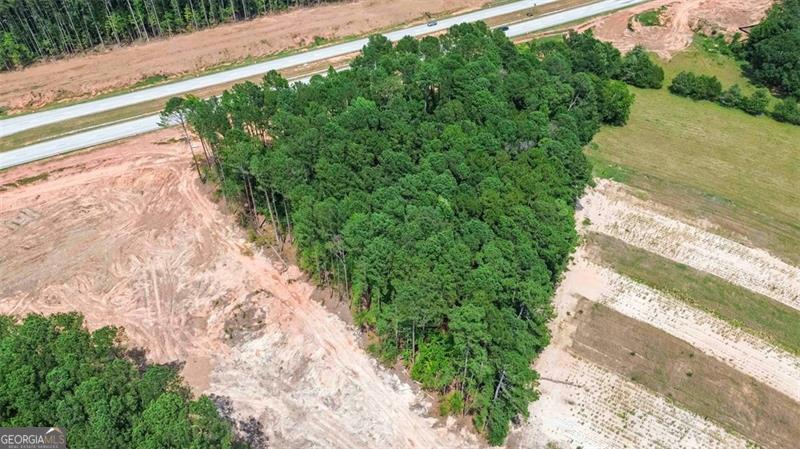 0 Mccarty Road Statham, GA 30666 - Photo 4 of 16 a view of a yard with wooden fence