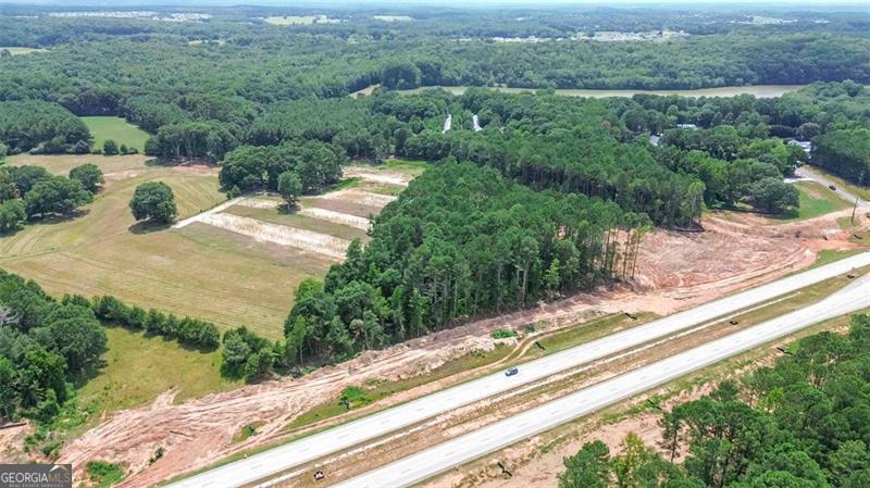 0 Mccarty Road Statham, GA 30666 - Photo 8 of 16 a view of a yard with a lake view