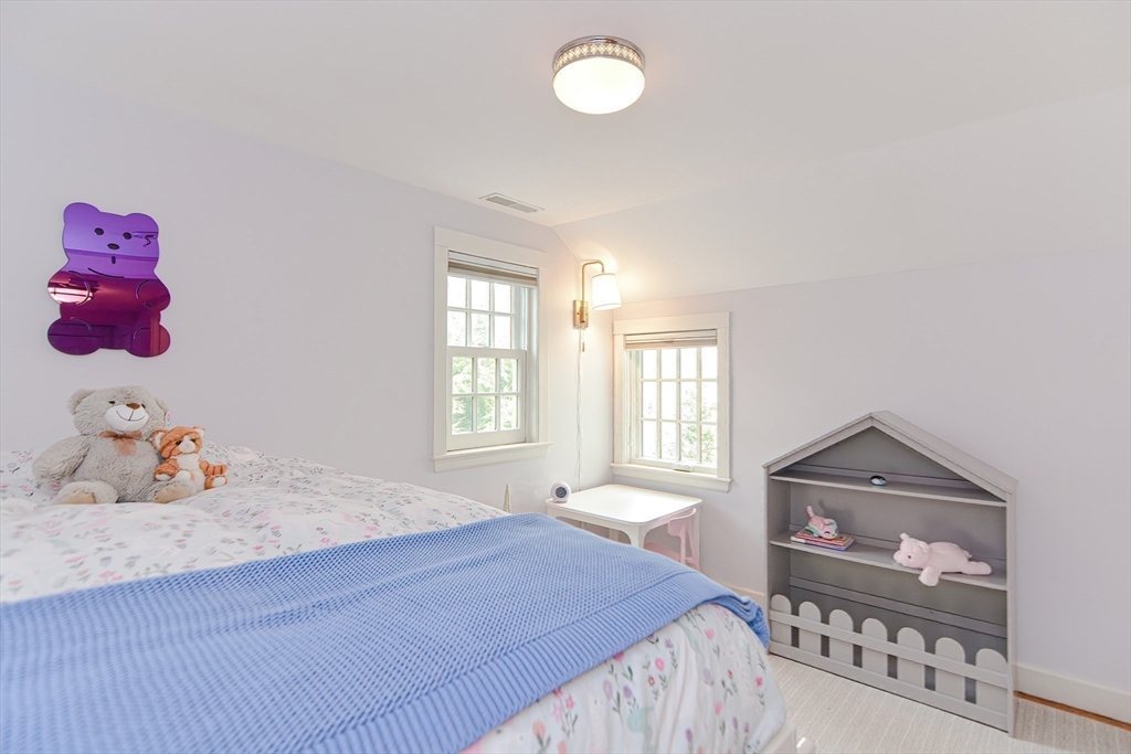 24 Standish Road Wellesley, MA 02481 - Photo 28 of 42 a bedroom with a bed and a window