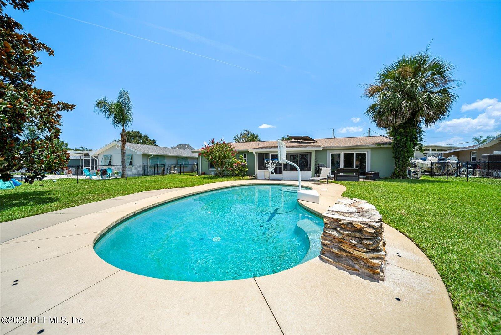 988 Shockney Drive Ormond Beach, FL 32174 - Photo 37 of 46 a view of a house with a backyard