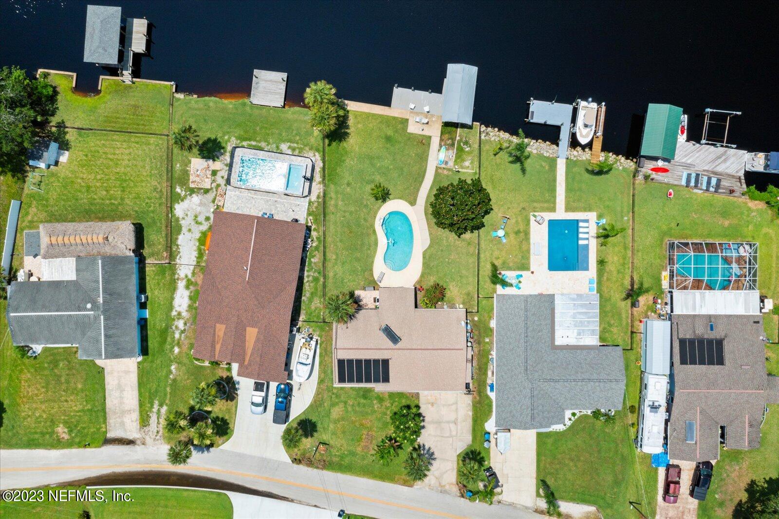 988 Shockney Drive Ormond Beach, FL 32174 - Photo 4 of 46 an aerial view of residential house with outdoor space and parking