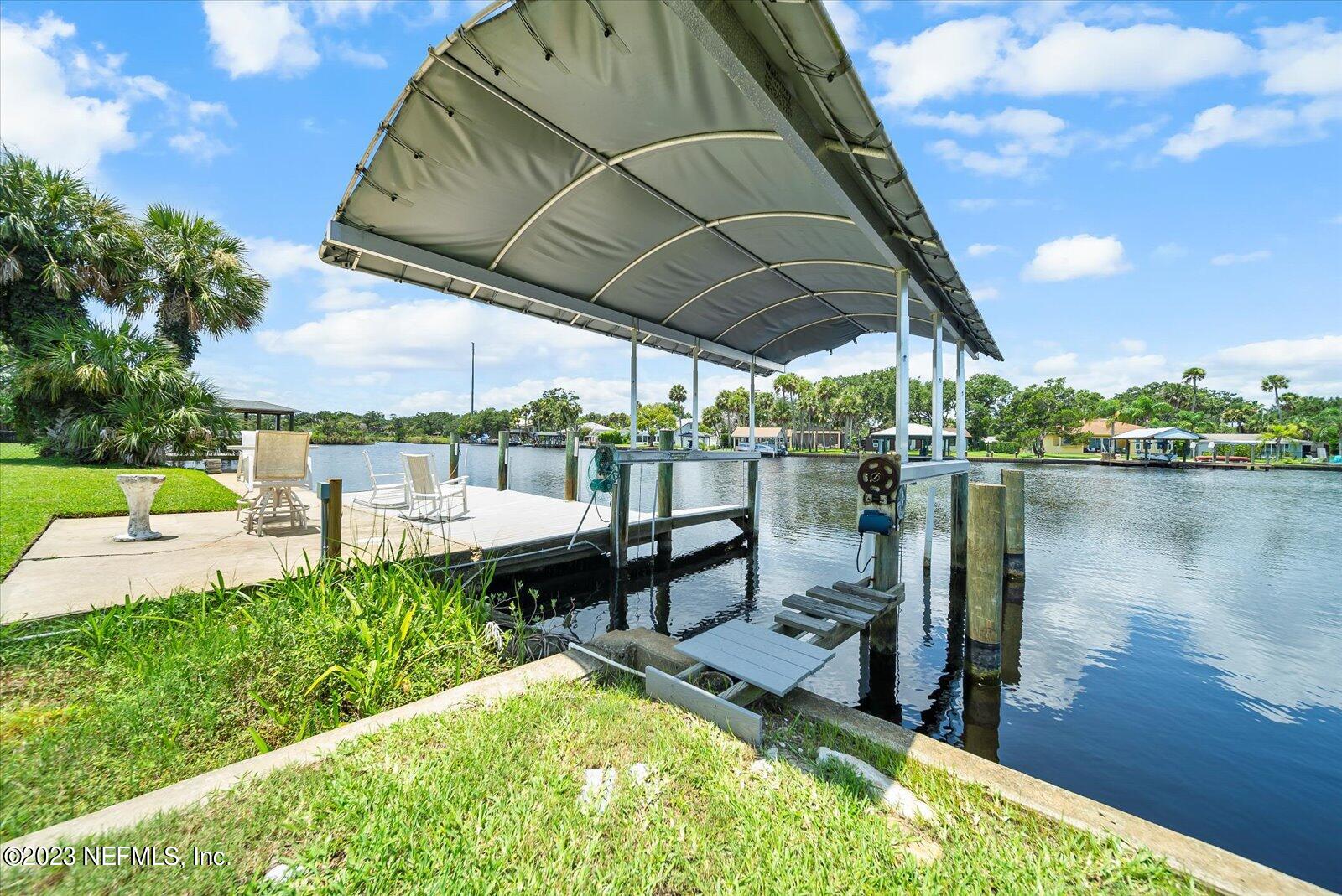 988 Shockney Drive Ormond Beach, FL 32174 - Photo 41 of 46 a view of a swimming pool with a patio