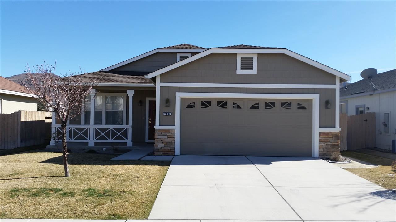 2160 Evergreen Street Reno, NV 89521 - Photo 1 of 1 a front view of a house with garage