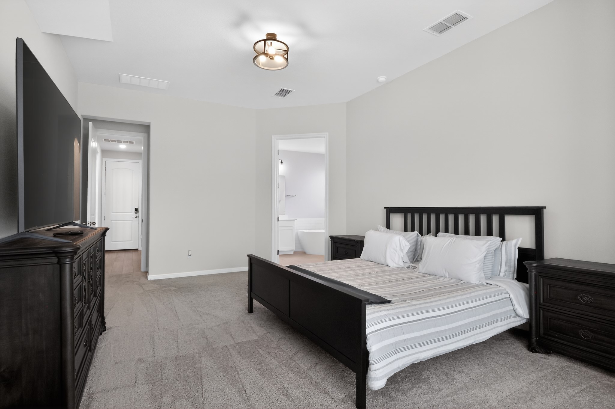 114 Bosco Road Hutto, TX 78634 - Photo 31 of 39 A well-proportioned bedroom offers serene comfort with ample space.