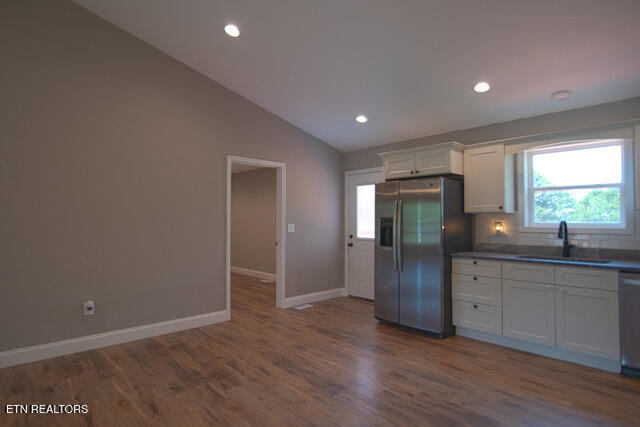 327 Thomas Loop Road Sevierville, TN 37876 - Photo 5 of 22 Kitchen into Laundry Room