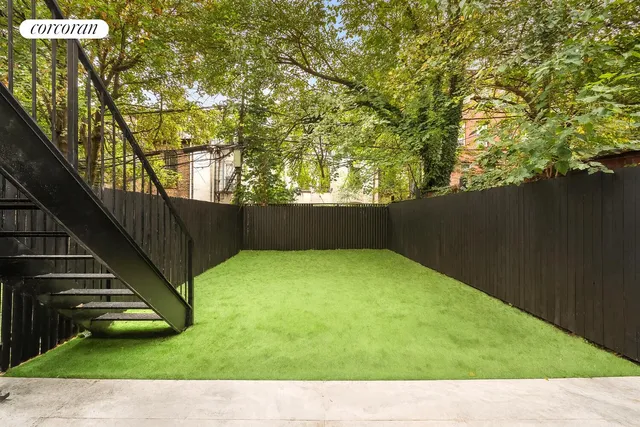 a view of balcony with a potted plant