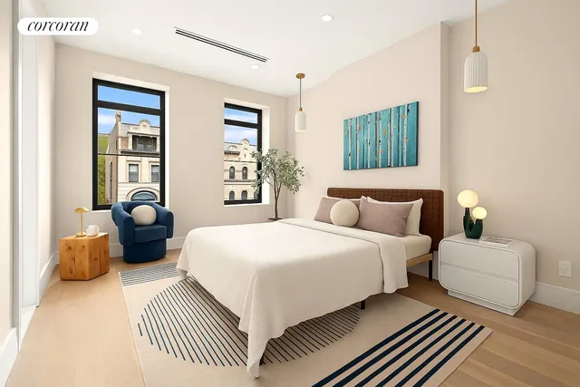 a view of a door with a white comforter