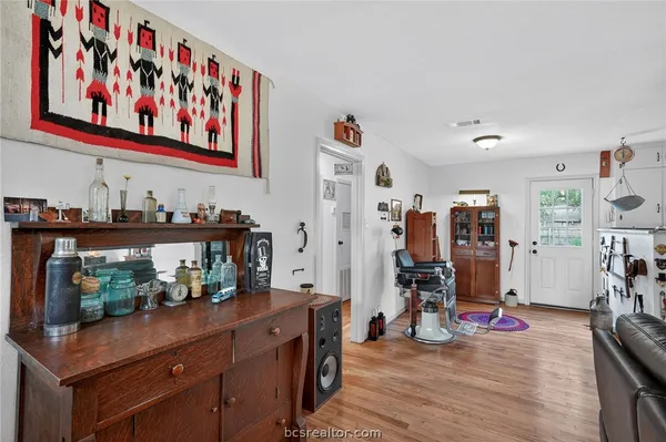 a view of a living room and bathroom