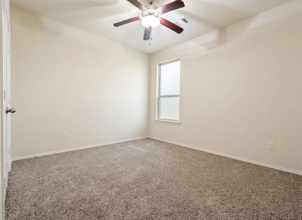 24315 Ravenna Landing Loop Spring, TX 77389 - Photo 19 of 37 an empty room with windows and fan