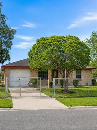 a house view with a garden space