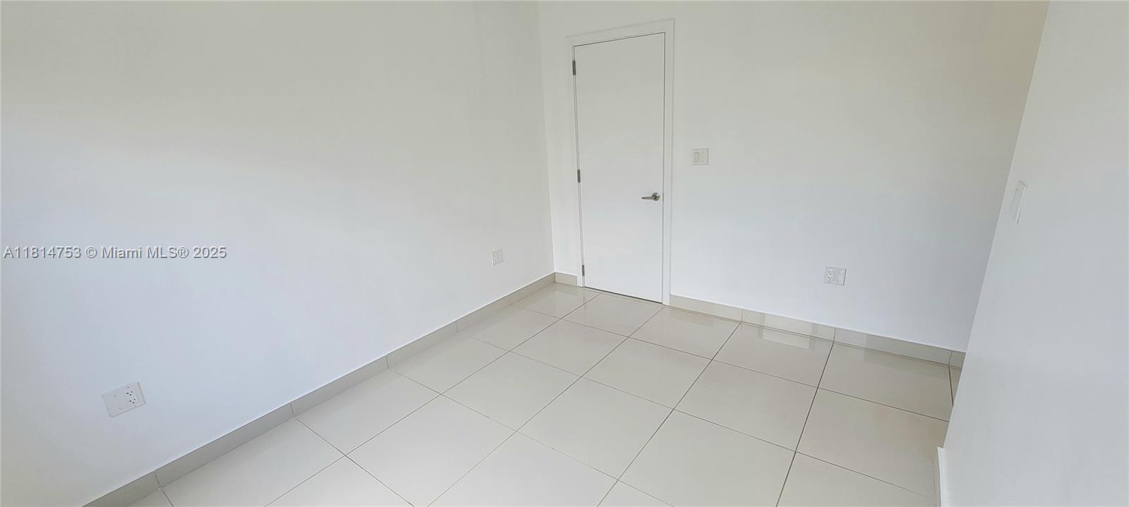 14004 Southwest 259th Street, Unit 14004 Homestead, FL 33032 - Photo 16 of 38 a view of an empty room