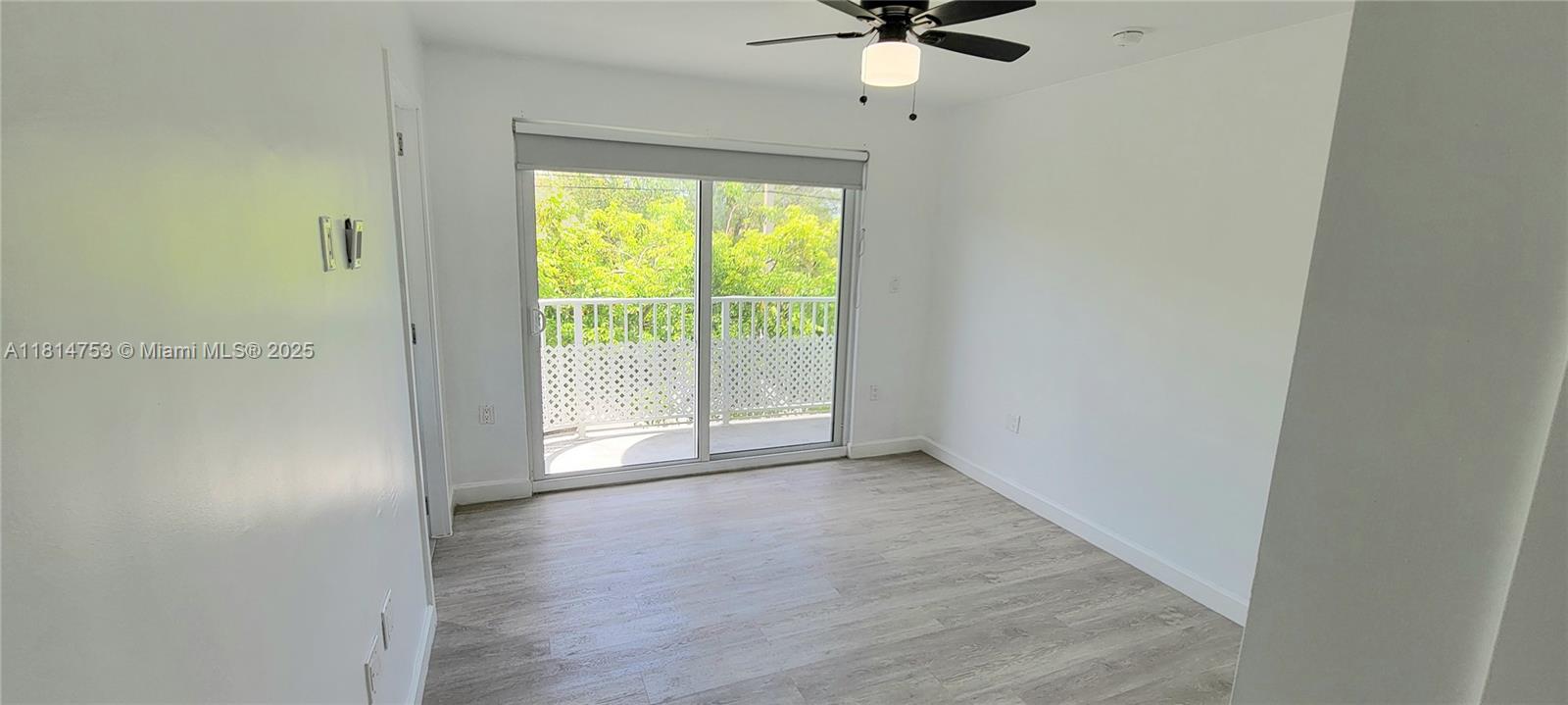 14004 Southwest 259th Street, Unit 14004 Homestead, FL 33032 - Photo 28 of 38 an empty room with a window