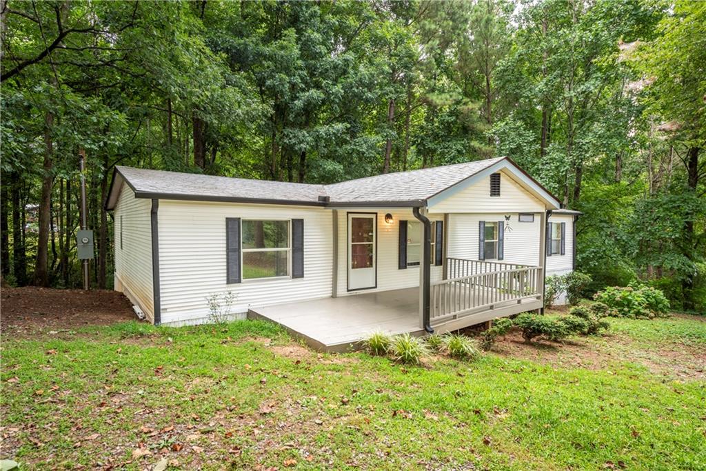 a front view of a house with yard