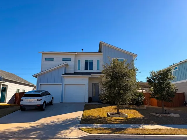a house view with a swimming pool