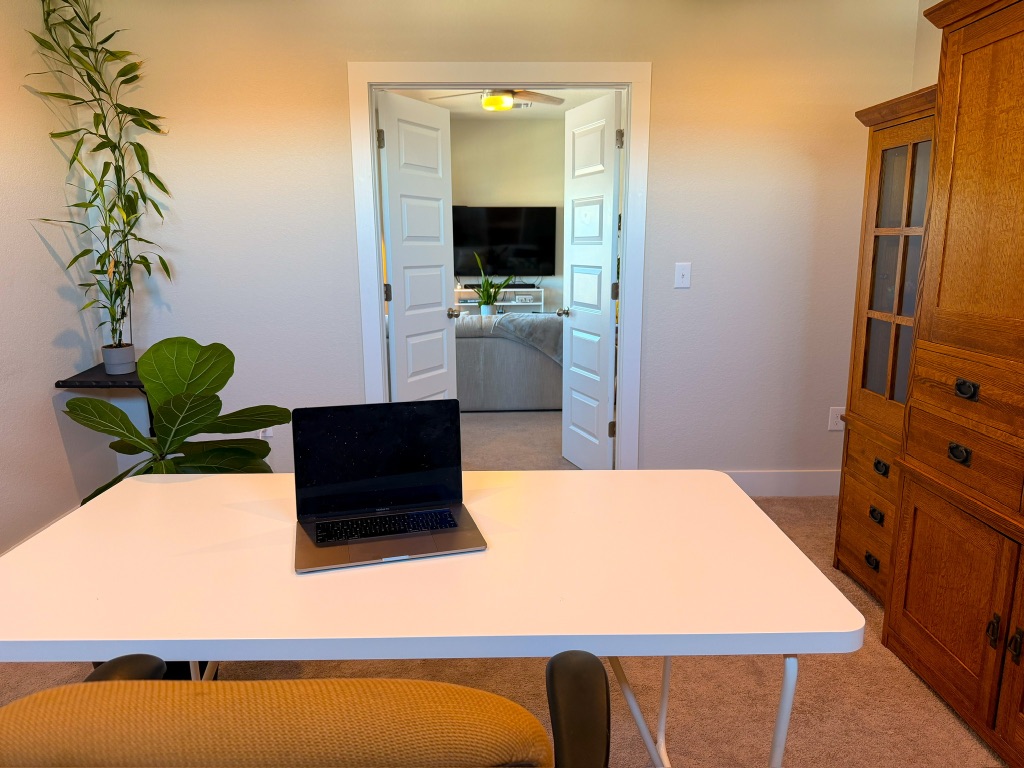11001 Charger Way Manor, TX 78653 - Photo 35 of 36 a living room with furniture and a flat screen tv