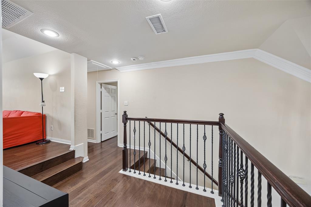 2865 Ridge View Road Frisco, TX 75034 - Photo 23 of 38 Wood-finish flooring throughout, recessed lighting, and crown molding
