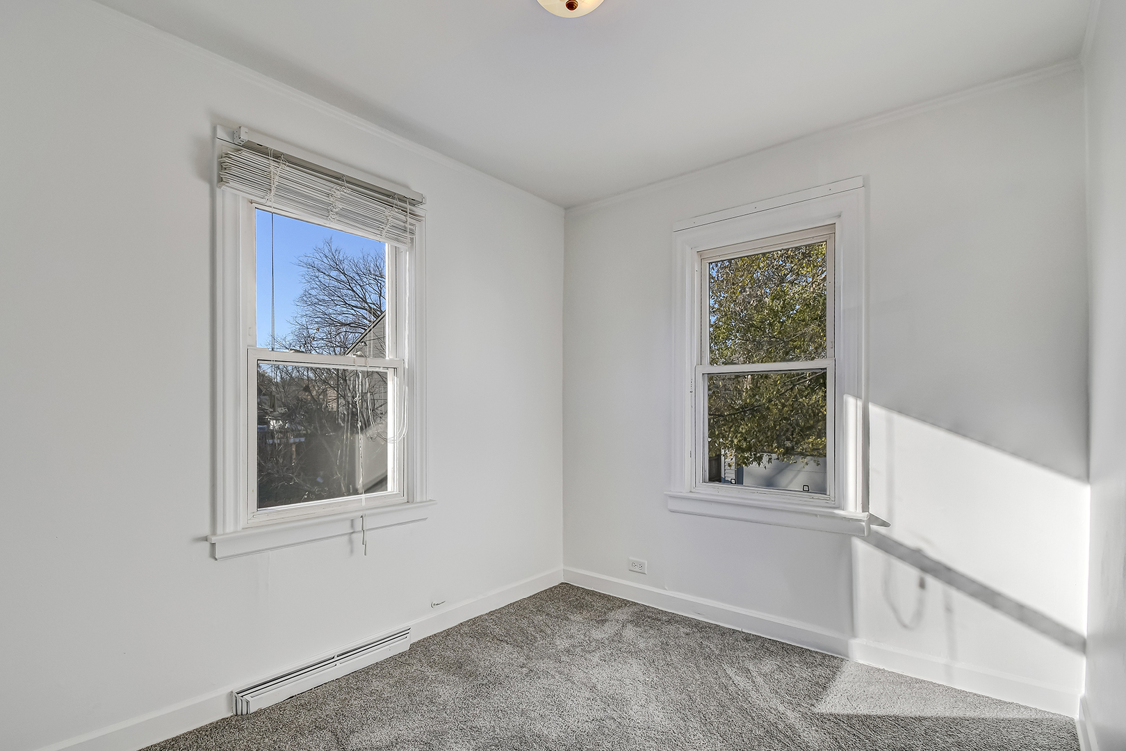 254 Village Road Willowbrook, IL 60527 - Photo 11 of 15 a view of an empty room with a window