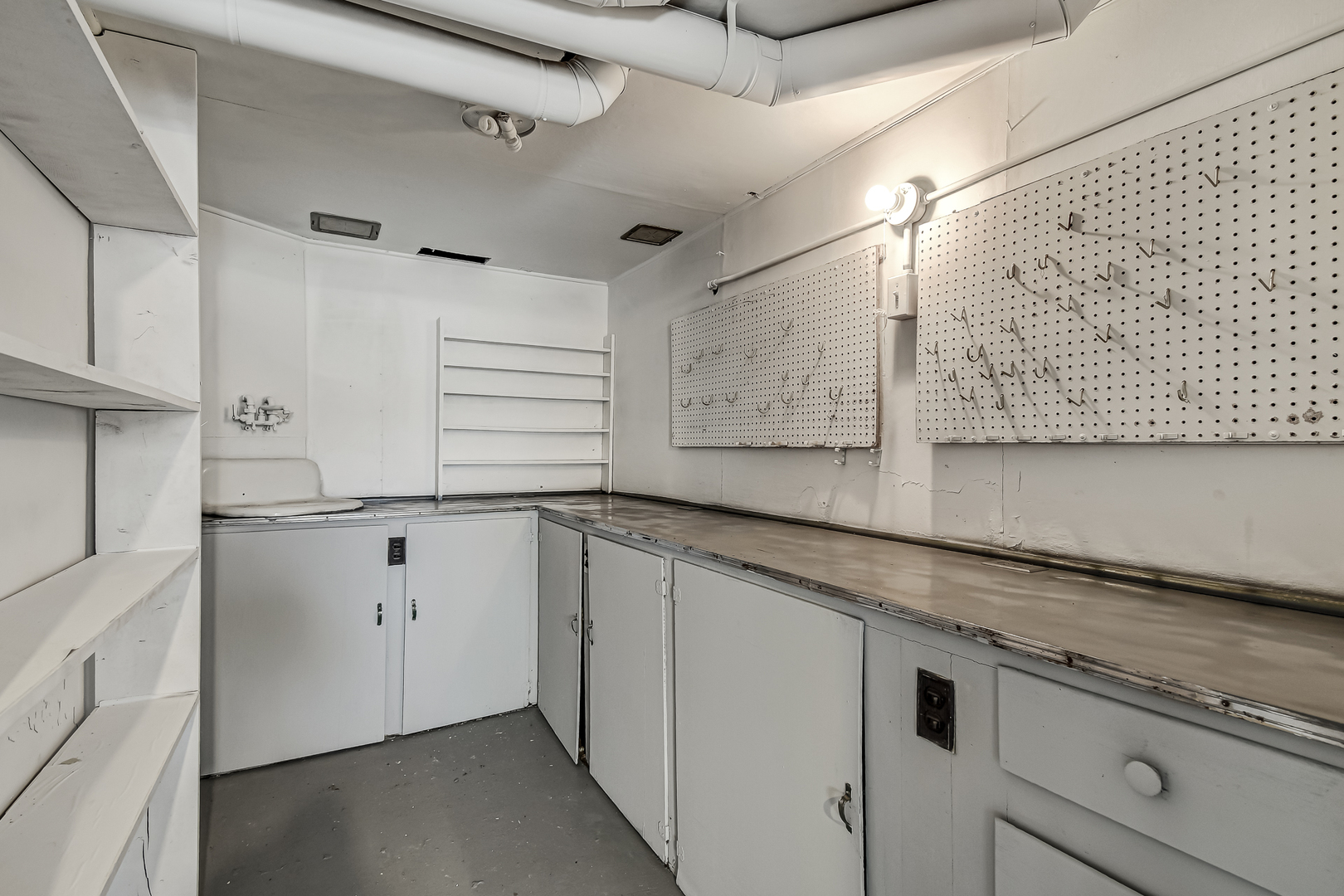 254 Village Road Willowbrook, IL 60527 - Photo 14 of 15 a kitchen with granite countertop white cabinets and white appliances