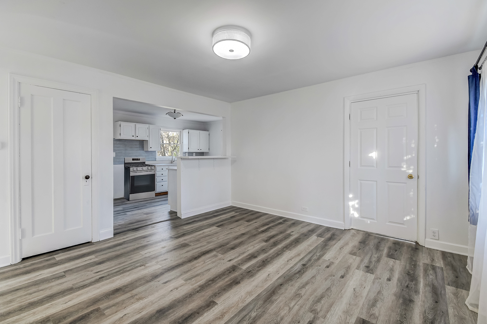 254 Village Road Willowbrook, IL 60527 - Photo 4 of 15 a view of empty room with wooden floor
