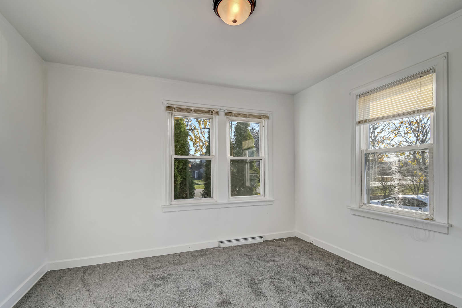 254 Village Road Willowbrook, IL 60527 - Photo 10 of 15 a view of an empty room with a window