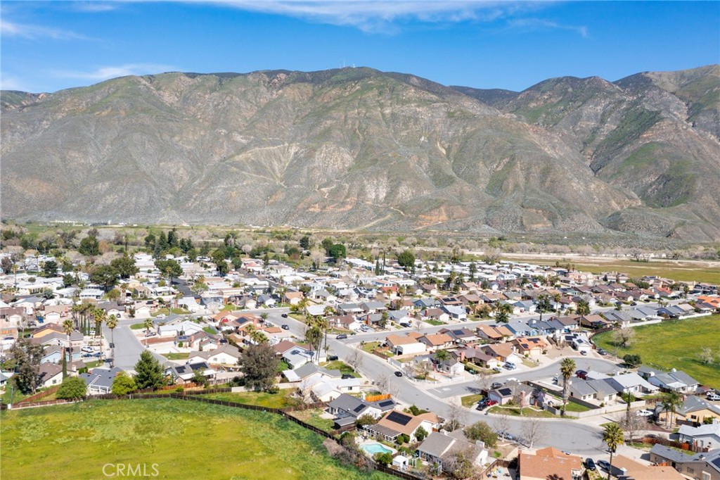 1738 The Willows Road San Jacinto, CA 92583 - Photo 11 of 34 an aerial view of residential houses with outdoor space
