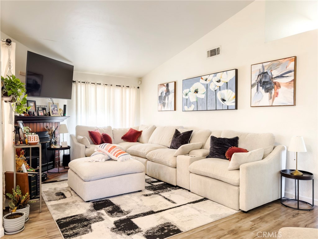 1738 The Willows Road San Jacinto, CA 92583 - Photo 16 of 34 a living room with furniture and a flat screen tv