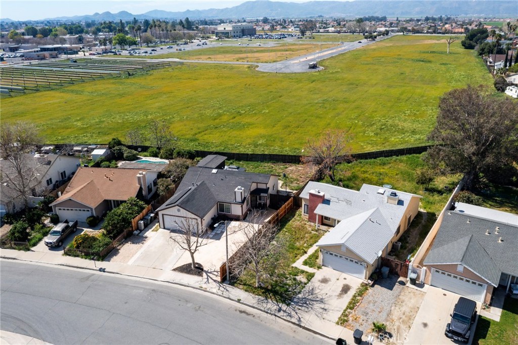 1738 The Willows Road San Jacinto, CA 92583 - Photo 6 of 34 an aerial view of residential houses with outdoor space