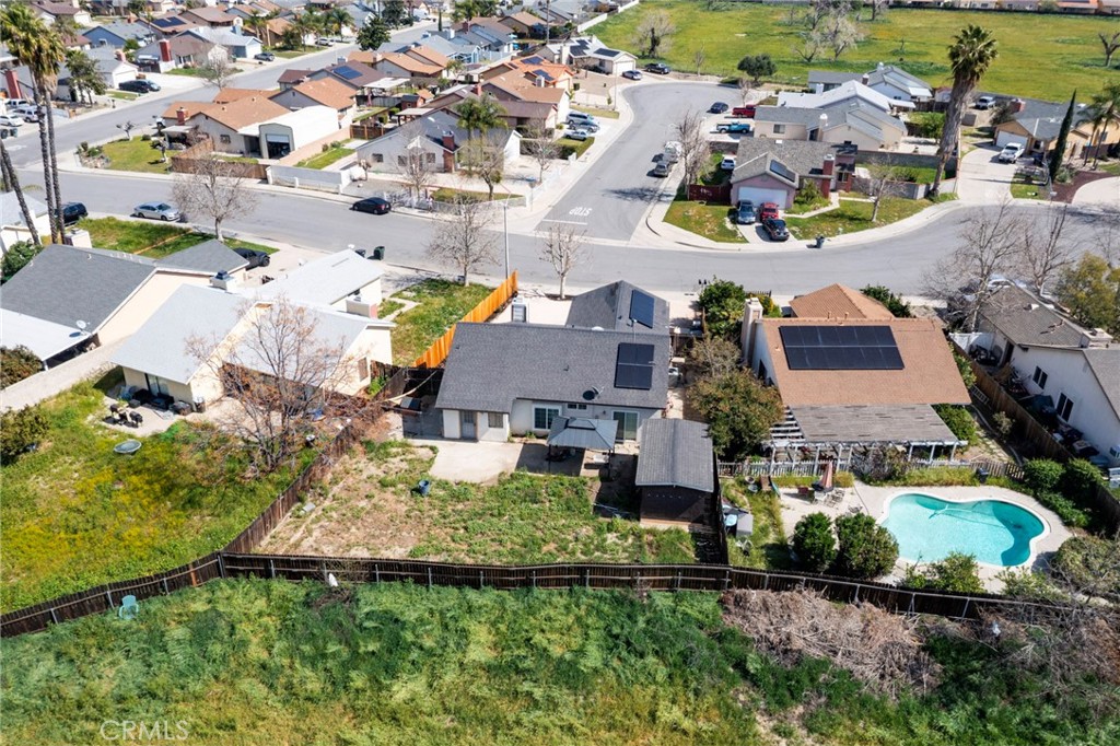 1738 The Willows Road San Jacinto, CA 92583 - Photo 9 of 34 an aerial view of multiple houses with yard