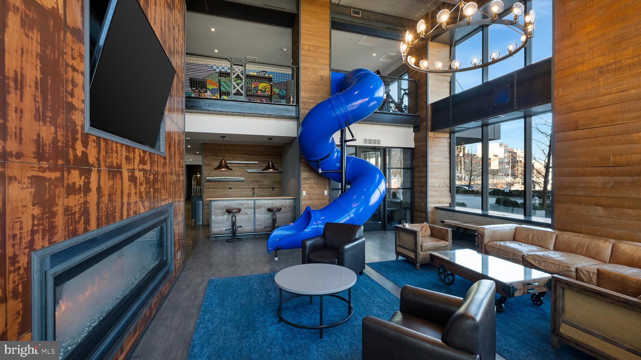 235 North Christopher Columbus Boulevard, Unit 506 Philadelphia, PA 19106 - Photo 45 of 55 a room with furniture and a fireplace