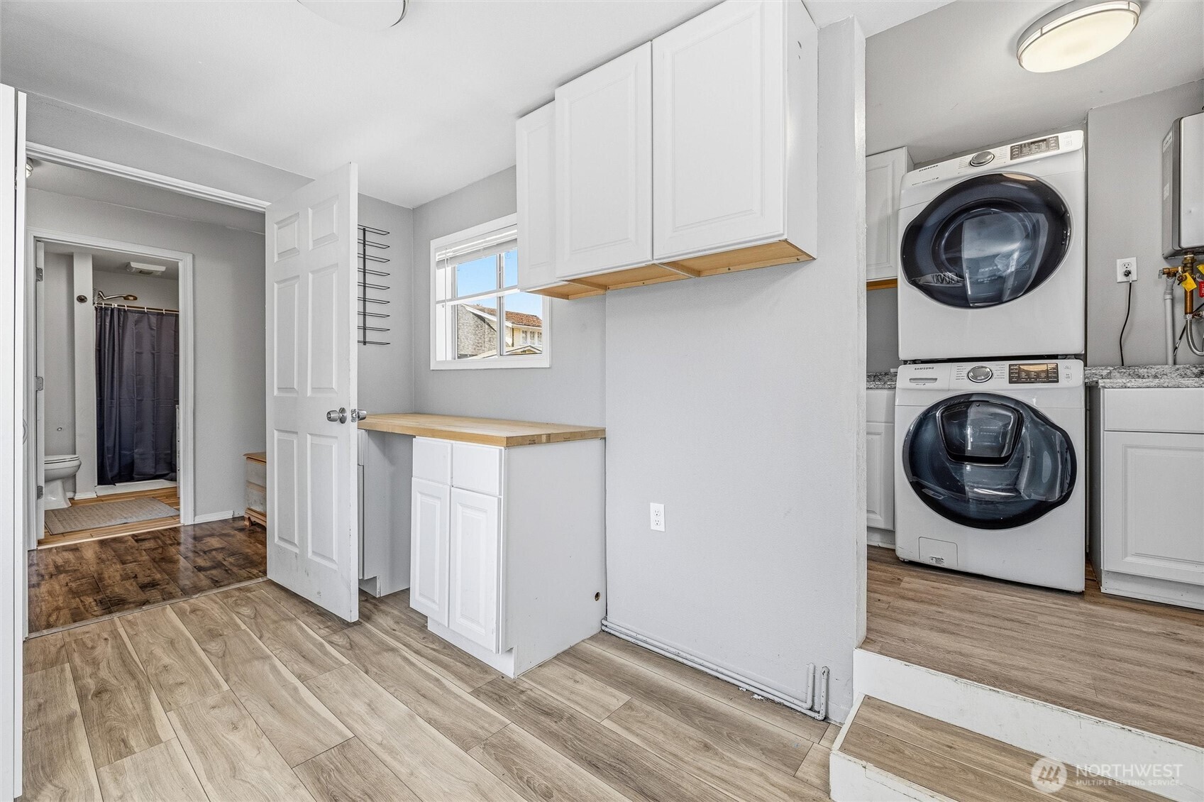 113 South Gardner Road Burlington, WA 98233 - Photo 19 of 40 a view of a hallway with washer and dryer