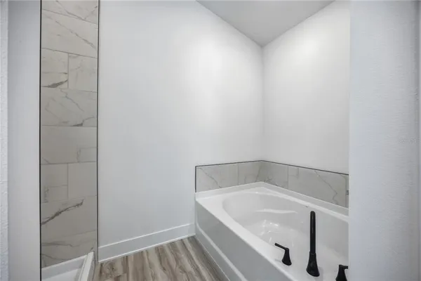 a bathroom with a bathtub