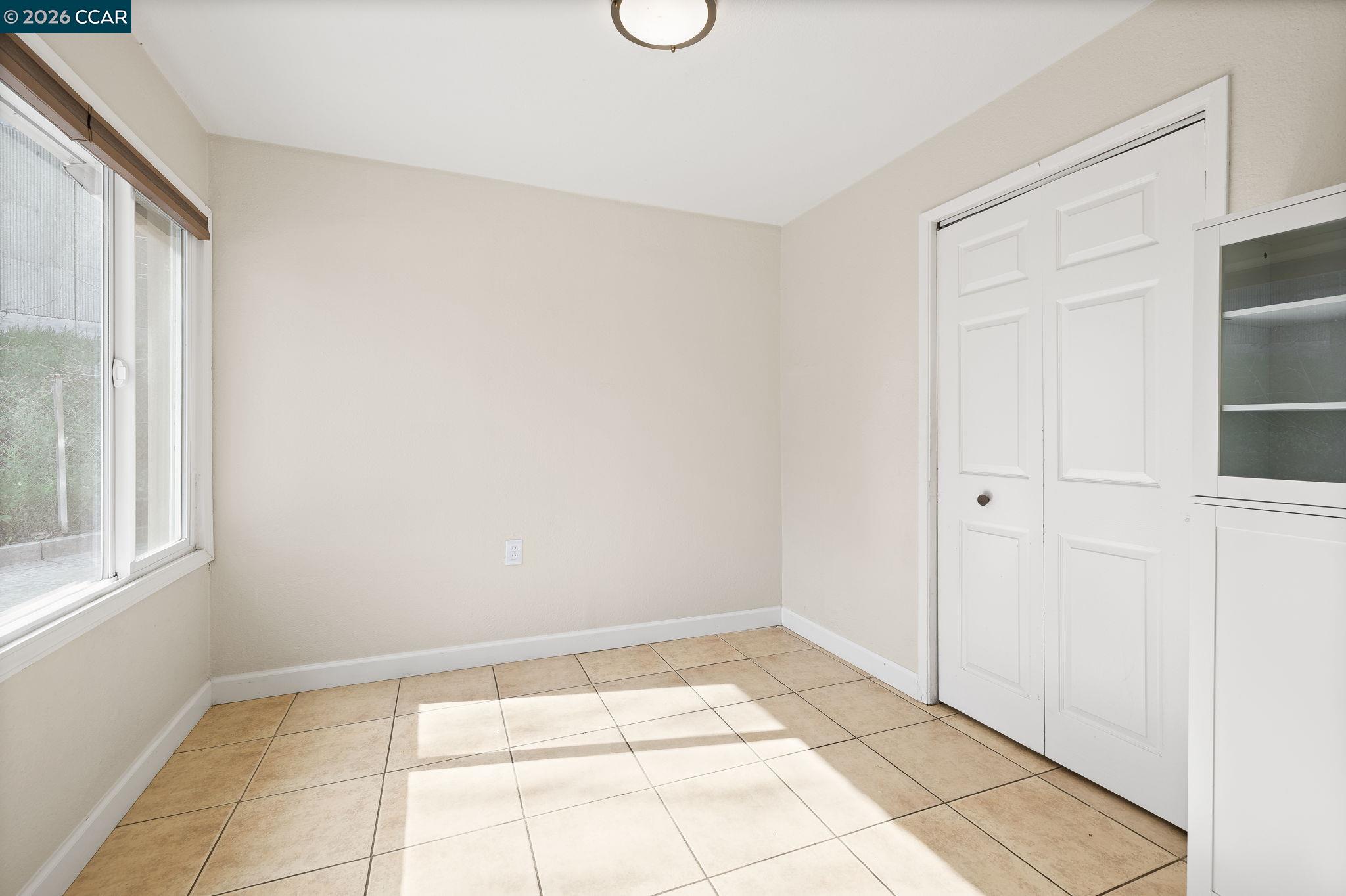 4820 Blum Road Martinez, CA 94553 - Photo 11 of 46 a view of an empty room and window