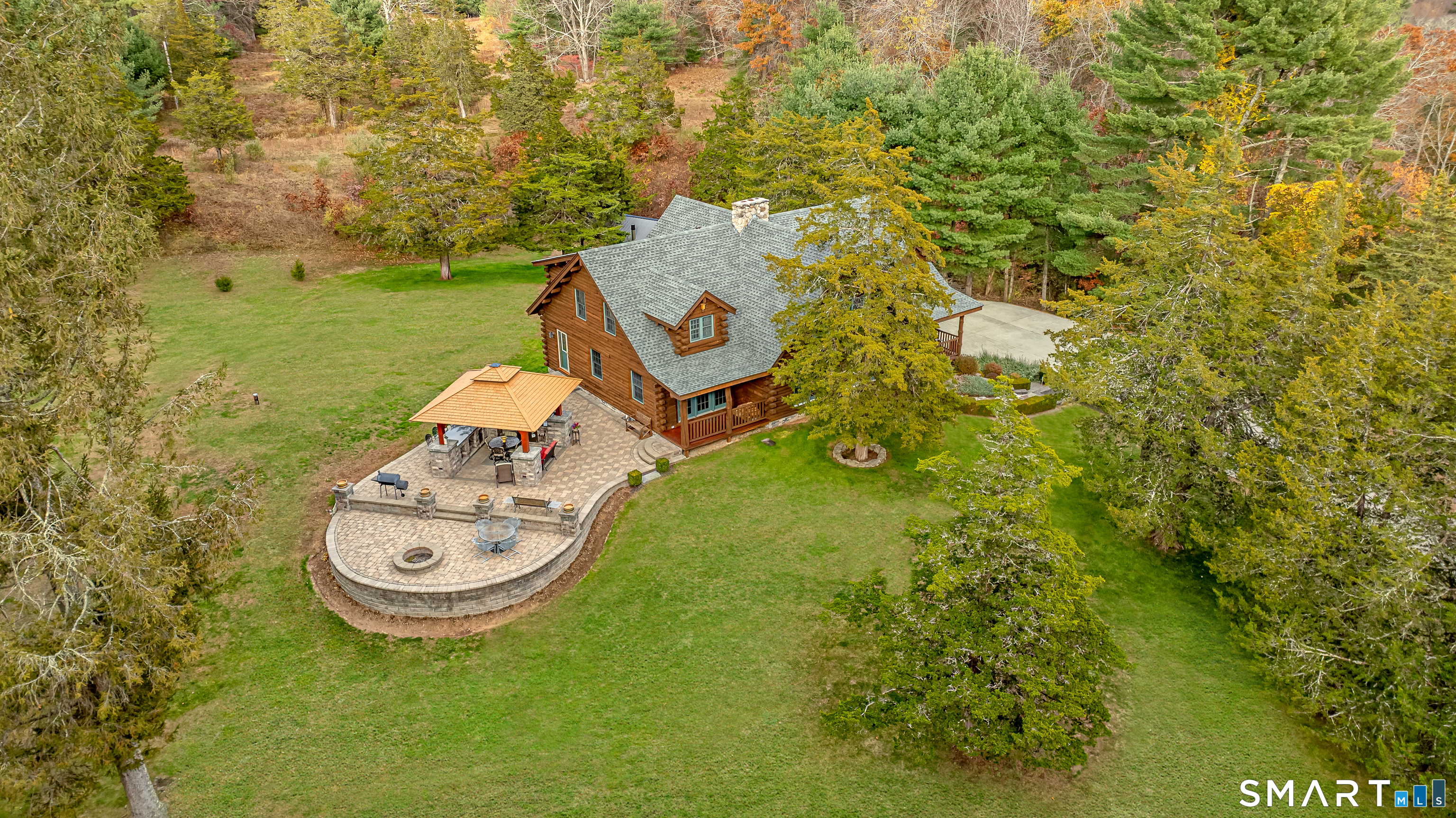 187 Chaplin Road Eastford, CT 06242 - Photo 2 of 40 Stone Patio with Bar and Fire-pit
