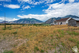 19 East Southfield Road Spanish Fork, UT 84660 - Photo 72 of 74 Mountain view with rural landscape