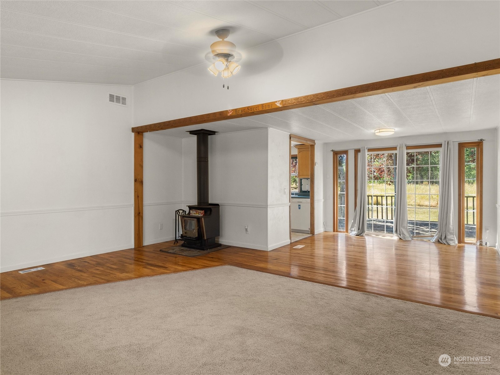 17929 Leitner Road Southwest Rochester, WA 98579 - Photo 8 of 40 a view of an empty room with window and wooden floor