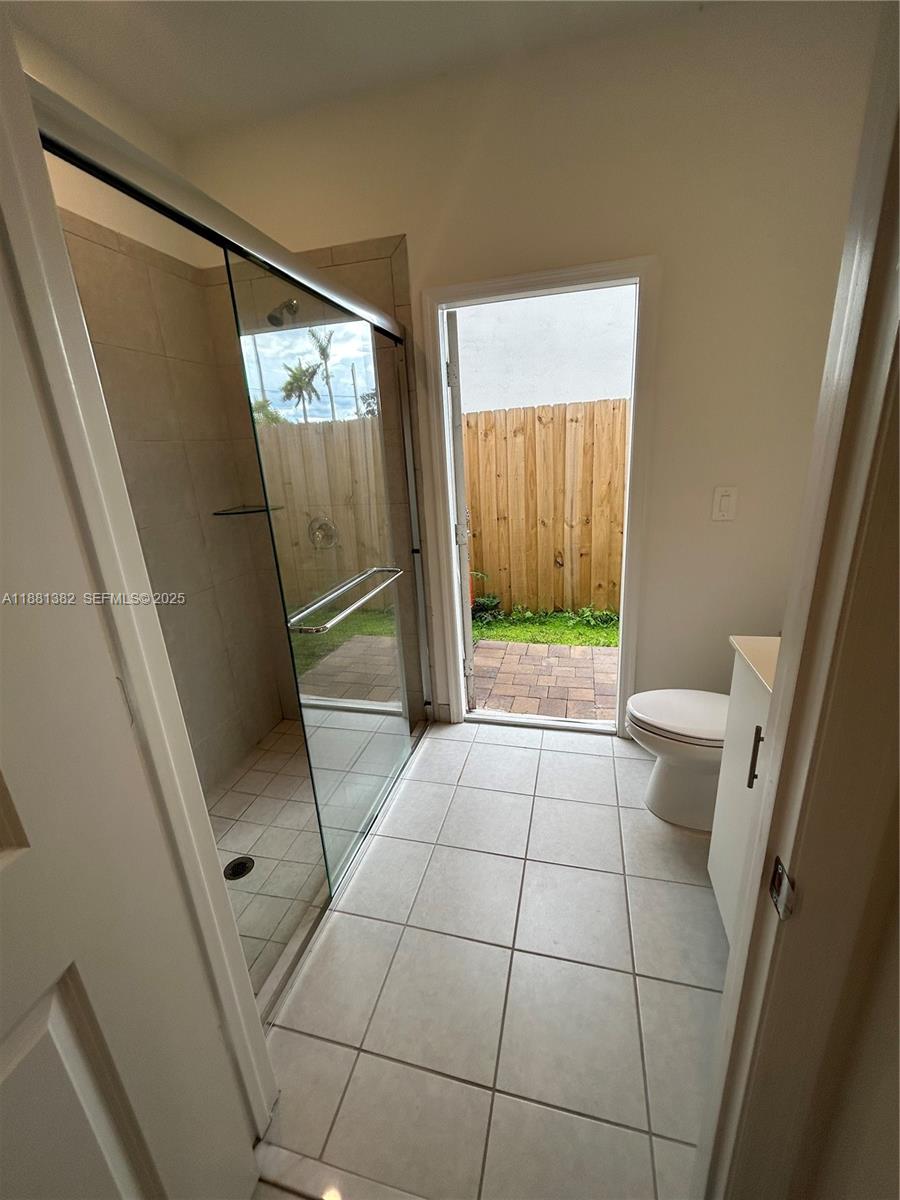 24030 Southwest 119th Place Homestead, FL 33032 - Photo 12 of 15 a bathroom with a sink and a toilet